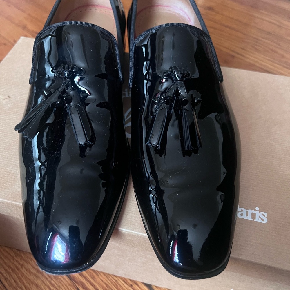 Selling my red bottom shoes